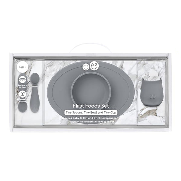 EzPz First Foods Set 100% Food Grade Silicone Baby & Toddler Suction Bowl with Built In Placemat - Grey