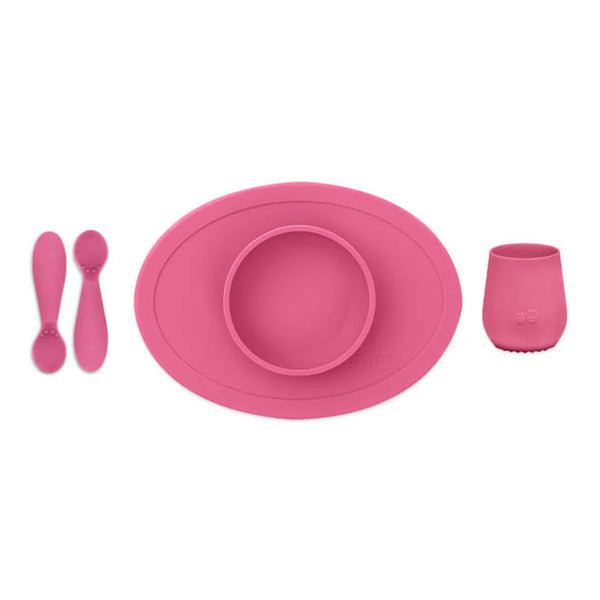EzPz First Foods Set 100% Food Grade Silicone Baby & Toddler Suction Bowl with Built In Placemat - Pink