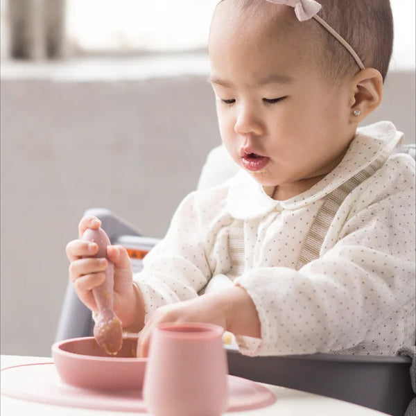EzPz First Foods Set 100% Food Grade Silicone Baby & Toddler Suction Bowl with Built In Placemat - Blush - Dezine Kids
