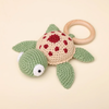 Soft crochet turtle baby rattle for visual development